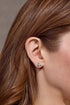 Gray diamond triangle earrings in 14 karat white gold, detail